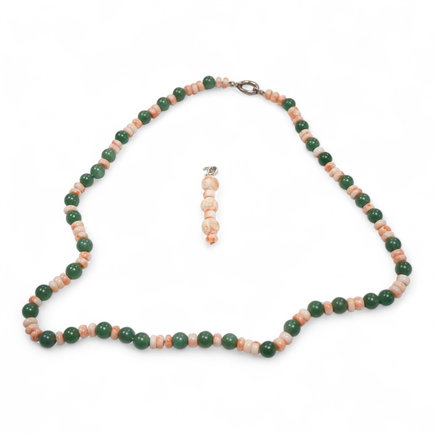 A 20th century adventurine quartz and coral bead set necklace, with a 925 clasp, 80cm, together with a similar carved coral line drop pendant, with a 750 white metal clasp.